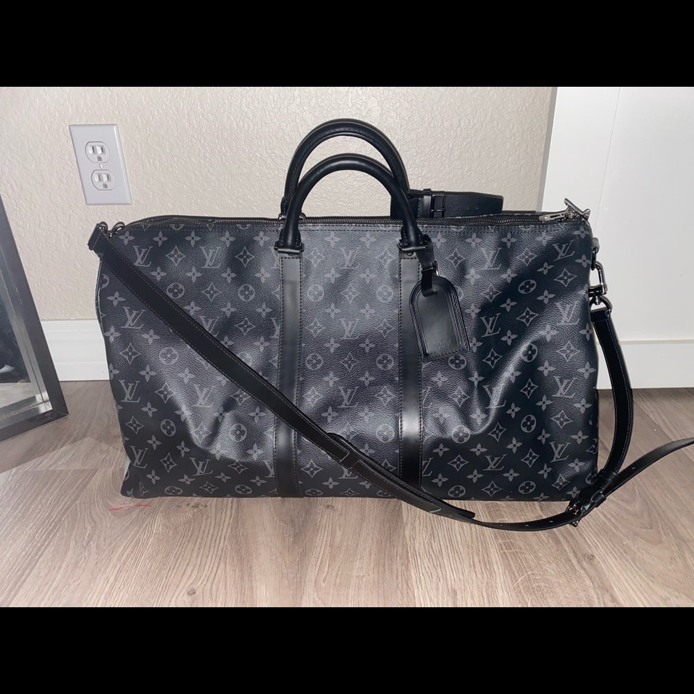 LV black duffel bag